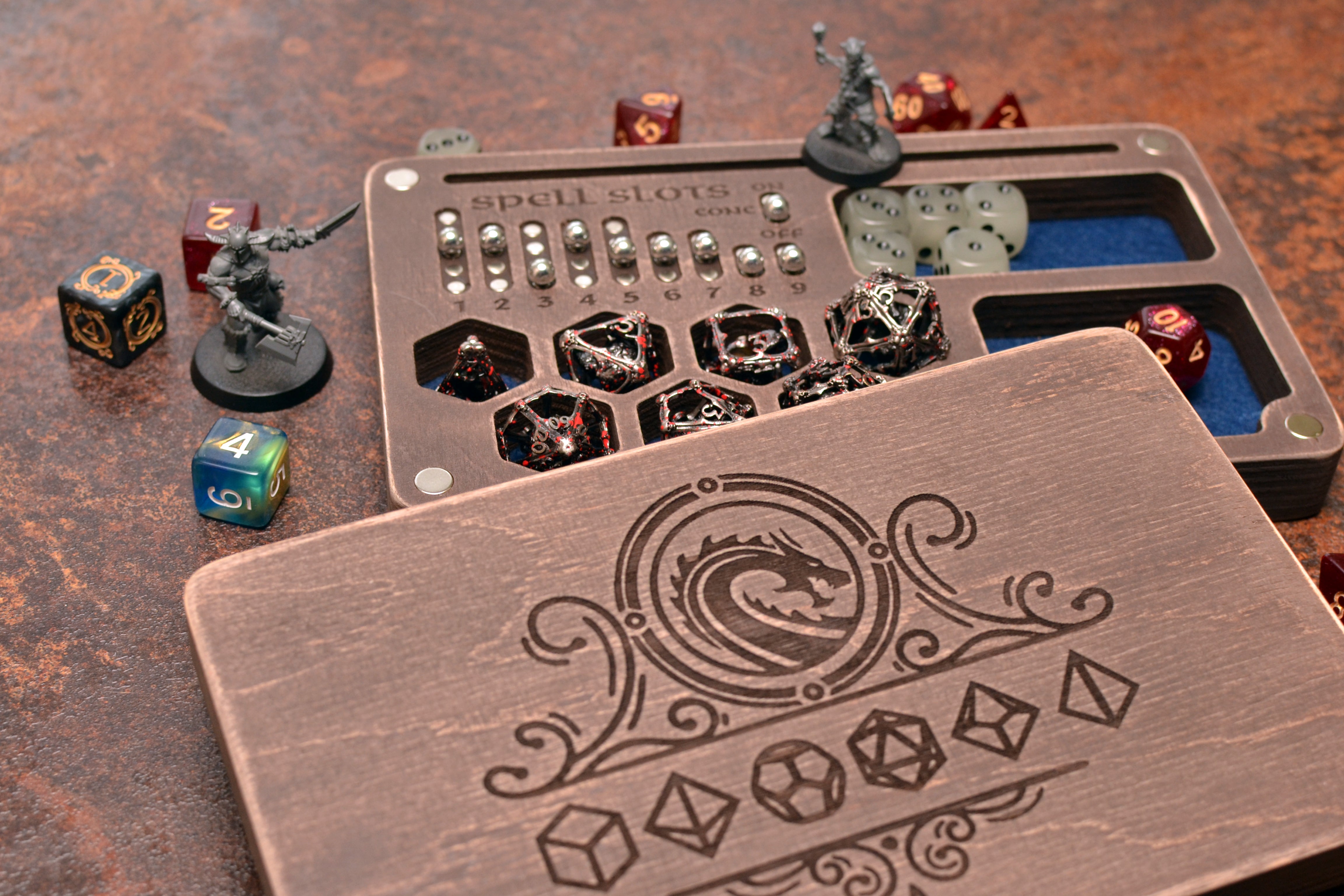 Handcrafted dice box with magnetic spell slot tracker and premium dice storage.